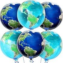 several blue and green globe balloons in the shape of the earth