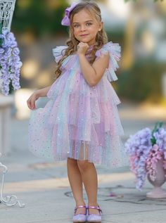 Your precious girl will look and feel like an enchanting princess in this magical tiered ruffle dress. Decorated with moon and star sequins, this rainbow number will have her shining and beaming with joy with every step!  Lightweight fabric feels good on her skin, keeping her cool and comfy even on warm summer days. Re Rainbow Dress Kids, Playful Rainbow Princess Dress For Party, Whimsical Rainbow Princess Dress For Birthday, Cute Rainbow Princess Party Dress, Whimsical Rainbow Tutu Dress For Birthday, Girls Holiday Outfit, Star Sequins, Multicolor Unicorn Print Tutu Dress For Dress-up, Girls Special Occasion Dresses