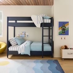 a bedroom with bunk beds and toys on the floor