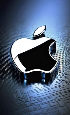 an apple logo is shown on top of a computer circuit board background with blue light