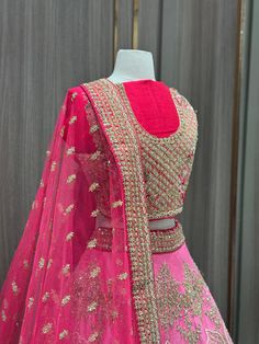 1. Pink ombre raw-silk lehenga features intricate details with multi-color resham, zardozi, sequins, and crystal embroidery. 2. Complete the ensemble with the included hot pink unstitched blouse and Net dupatta 3. Ready to ship ! Pink Organza Lehenga With Pallu, Pink Organza Lehenga For Navratri, Pink Tissue Silk Dress For Navratri, Pink Organza Lehenga With Zari Work, Pink Organza Choli For Navratri, Pink Organza Saree Lehenga, Pink Organza Choli With Traditional Drape, Pink Organza Sharara With Pallu, Pink Organza Sharara With Pallu Detail