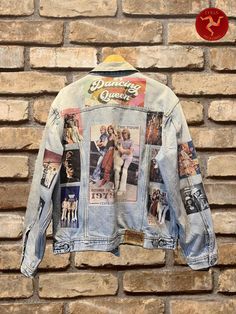 This vintage denim jacket is a true treasure for fans of classic music and retro fashion! Featuring vibrant prints of the iconic Swedish band ABBA, this jacket captures the spirit of the 1970s. The back showcases a bold "Dancing Queen" graphic along with images of the band members, tour posters, and concert moments, making it a nostalgic piece for any collector or fashion enthusiast. The faded, well-worn denim gives it that authentic vintage feel, perfect for adding a touch of retro flair to you Retro Denim Jacket For Fall, Vintage Long Sleeve Outerwear For Concerts, Vintage Outerwear With Graphic Print For Streetwear, Vintage Graphic Print Denim Jacket For Spring, Vintage Denim Jacket With Graphic Print For Spring, Vintage Denim Outerwear With Graphic Print, Vintage Denim Jacket With Graphic Print For Streetwear, Retro Denim Jacket With Graphic Print For Streetwear, 90s Graphic Print Cotton Outerwear