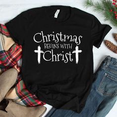 Embrace the True Spirit with a Religious Christmas Shirt: Christ-Centered Design Celebrate the real meaning of Christmas with our inspiring Religious Christmas Shirt. This Christ-centered design reminds us all that Jesus is the reason for the season. Perfect for church services, family gatherings, or any holiday event where you want to express your faith. Our thoughtfully crafted shirt features a beautiful design that proclaims the significance of Christ in Christmas. It’s an excellent way Christian Christmas Shirts, Christmas Shirts For Women, Christian Christmas Shirts Vinyl, Christian Christmas Tee Shirts, Christmas Christian Tshirts, Christmas Tshirts Nativity, Cricut Christmas Shirts Jesus, Jesus Christmas Shirt, Biblical Christmas