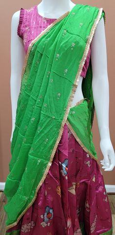 Elegant Banaras Digital Printed half saree set in Green and Pink Blouse size : 32 Inches Lehenga length: 39 inches Pista Green Anarkali Style Pre-draped Chanderi Saree, Pista Green Art Silk Sharara In Traditional Drape, Pista Green Anarkali Saree Set For Festivals, Pista Green Anarkali Floor-length Pre-draped Saree, Multicolor Semi-stitched Pre-draped Saree With Dori Work, Pista Green Art Silk Anarkali Set With Traditional Drape, Pista Green Art Silk Pre-draped Saree For Puja, Pre-draped Saree With Sheer Dupatta For Navratri Puja, Green Cutdana Pre-draped Saree Floor-length