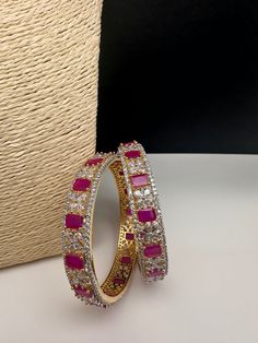 Traditional Bangles comes in set of 4Color : GoldSize : Size : 2.4Stones : AD Red Stones Traditional Bangles, Ruby Bangles, Red Bangles, Indian Bangles, Red Stones, Bangles Set, Bangles Indian, Diamond Bangle, American Diamond