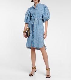 Puff Sleeve Denim Shirt Dress in Blue - Stella Mc Cartney | Mytheresa Chic Belted Puff Sleeve Dress For Daywear, Chic Short Sleeve Denim Dress For Daywear, Chic Belted Button-up Denim Dress, Spring Puff Sleeve Belted Dress For Daywear, Chic Knee-length Belted Denim Dress, Chic Belted Knee-length Denim Dress, Chic Belted Denim Dress For Day Out, Summer Denim Dress With Button Cuffs, Chic Belted Denim Dress For Work