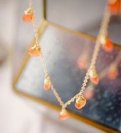 Embrace the magic of Carnelian with our natural multi-teardrop necklace! Handcrafted with authentic Carnelian gems, this necklace is perfect for that classic look. And for those who love a boho-chic style... this piece plays well with others and loves to be layered!Carnelian, an orange variety of Quartz, is said to act as an energy booster, stimulating your motivation, endurance, and courage. So go ahead, let this dainty piece turn heads and hearten your spirits!This piece will be hand-made in y Orange Briolette Jewelry For Gift, Orange Gemstone Drop Jewelry, Orange Drop Gemstone Jewelry, Handmade Orange Teardrop Necklace, Amber Teardrop Necklaces For Jewelry Making, Gold Teardrop Drop Necklace With Natural Stones, Gold Carnelian Necklace With Natural Stones, Carnelian Gemstone Drop Jewelry, Amber Teardrop Necklace For Jewelry Making