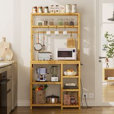 a kitchen with a microwave, toaster and other items on the shelve