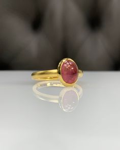 Natural Pink Tourmaline Ring * Dainty Cabachon Ring * Genuine Tourmaline & 14K Solid Gold * Best Gift for Her/Him * Handmade Ring ◎ Details ◎ ○ Gemstone Details .Natural PINK TOURMALINE Oval Cut 9X7 mm approx. 2.09 ct ○ Gold Details 14K Solid Gold Width of Band : 2.50 mm Weight of Ring : approx 3.80 gr Made to Order HANDMADE ITEM ○ Upgrade to Solid 18K Gold, please click the link below: https://www.etsy.com/listing/962826004 For more CABACHON BEZEL rings : http://etsy.me/37fvI60 All of our j Heirloom Gold Tourmaline Ring, Classic Gold Tourmaline Jewelry, Gold Oval Tourmaline Ring, Gold Tourmaline Gemstone Rings, Gold Tourmaline Rings, Yellow Gold Tourmaline Cabochon Ring, Yellow Gold Tourmaline Birthstone Ring Gift, Classic Gold Tourmaline Rings, Handmade Tourmaline Gold Ring