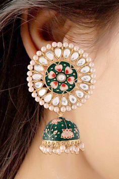 I Jewels 18k Gold Plated Traditional Handcrafted Kundan Pearl Studded Meenakari Jhumki Earring for Women (E2917G) Stylish meenakari worked traditional 18k gold plated round stud earrings with lovely combination of colors from I Jewels. These earrings, made with Love by our karigar with real carftmanship, will complement any occasion ethnic wear. These beautiful earrings are handcrafted in alloy with pearls of good quality. Coated with high quality and thickness gold. Product Features: Color: Gre Gold Plated Round Earrings For Diwali, Navratri Round Jhumkas With Intricate Design, Gold Meenakari Danglers, Traditional Gold Plated Meenakari Danglers, Traditional Meenakari Gold-plated Danglers, Traditional Meenakari Danglers In Gold Plated, Traditional Gold-plated Chandbalis For Pierced Ears, Traditional Round Jhumkas With Latkans, Festive Bridal Earrings With Meenakari