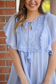 Flutter sleeves and a fabulous bit of fringe and crochet make this blouse ultra dreamy! Tassel ties give it an extra dose of personality. Fabric is a lightweight rayon-blend. Fabric is semi sheer, so you may want to pair with a cami. Flutter Sleeve, Colorful Fashion, Boutique Clothing, Summer Fun, Cute Dresses, Tunic Tops, Ruffle Blouse, Crochet, Dresses