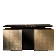 a black and gold cabinet with two doors on the front, one door open to reveal a large piece of art