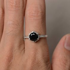 This is a gorgeous handmade creation. Its beauty is its simplicity & Elegance. The 7*7mm round cut natural black spinel is crafted in solid sterling silver and with rhodium plated. It is available to customized, if you have any mind, just let me know, we will discuss with it. All item is sent in a beautiful gift box You can realize more lovely stuff clicking the link https://www.etsy.com/shop/knightjewelry?refshopsection_shophome_leftnav Please leave the correct address and you PHONE NUMBER Black Anniversary Rings, Black Round Sapphire Ring For Anniversary, Gift Rings With Black Diamonds In Round Cut, Gift Black Diamond Round Ring, Black Solitaire Ring As Gift, Black Diamond Rings In Sterling Silver, Gift Black Diamond Round Cut Ring, Classic Rings With Black Diamonds As Gift, Classic Rings With Black Diamonds For Gift