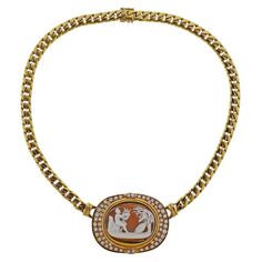 18k yellow gold pendant on curb link necklace. Set with diamonds approx. 1.50ctw, and shell cameo - 28mm x 19mm. Measures - 15.75" long x pendant 45mm x 33mm. Marked 18k 750. Weight 78.6 grams. Vintage Cameo, Cameo Necklace, Yellow Gold Pendants, Link Necklace, Gold Pendant, Custom Jewelry, Necklace Set, Fashion Art, Gold Diamond