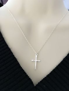 "Handmade with love! Delicate Cross necklace is great gift ideas for Mom, for your wife, for birthday, for Baptism, Christmas, Mother's day, gift for her, for mom, grandma, best friend, sister, daughter, bridesmaid gift.... MATERIALS: - Silver Plated chain and components. - Sterling silver Cross size 11.6mm x 20.6mm. - The model is wearing a 18\" inches necklace from end to end. - Gold Plated chain and components. - Gold Plated Cross. HOW TO ORDER: ** Please click on the drop down menu select ne Simple Cross Jewelry For Gifts, Nickel-free Cross Pendant Necklace As Gift, Dainty Sterling Silver Cross Necklace For Gift, Minimalist 16 Inch Charm Necklace As Gift, Minimalist 16-inch Charm Necklace For Gift, Minimalist 16-inch Charm Necklace As Gift, Cross Jewelry For Birthday And Mother's Day, Silver Cross Pendant Charm Necklace Gift, Nickel Free Cross Charm Necklaces As Gift