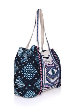 Turn heads with the Smokey Evil Eye Tote, a stunning blend of hand-beaded artistry and intricate embroidery. Lightweight yet spacious, it's the perfect companion for travel, beach outings, or any occasion where you want to stand out. Key Benefits & Features: Evil Eye Design: Hand-beaded and embroidered with the captivating evil eye motif, this tote offers both protection and style. Versatile & Spacious: With dimensions of 24" x 13" x 6", this tote is perfect for carrying your essentials in style Bohemian Large Capacity Canvas Bag For Summer, Summer Bohemian Large Canvas Bag, Summer Vacation Beaded Shoulder Bag, Bohemian Canvas Bag With Large Capacity For Vacation, Bohemian Large Capacity Canvas Bag For Vacation, Large Capacity Bohemian Canvas Bag For Vacation, Summer Beaded Shoulder Bag For Daily Use, Beaded Shoulder Bag For Daily Use In Summer, Summer Vacation Beaded Beach Bag