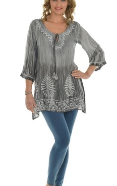 "Add a bohemian feel to your casual ensembles by wearing this long sleeves tunic top crafted with colorful adorable tie-dye and embroidered neckline. Features: * Embroidery on neck and cuff * Tie-dye Ombre pattern * Scoop neck with keyhole * Three-fourth sleeves * Leaf batik print on the hem * Unlined * Pullover * 100% Rayon * Size S: 31\" long from high point of shoulder to hem This tunic top features a beautifully embroidered and hand-dyed tie-dye pattern on rayon. This lightweight and relaxed Bohemian Half Sleeve Tops For Fall, Bohemian Blouse With 3/4 Sleeves For Summer, Bohemian 3/4 Sleeve Summer Blouse, Bohemian Half Sleeve Blouse For Vacation, Bohemian Spring Tops With 3/4 Sleeves, Bohemian Half Sleeve Blouse For Beach, Bohemian Half Sleeve Beach Blouse, Bohemian Half Sleeve Tops With Relaxed Fit, Bohemian Half Sleeve Tops Relaxed Fit