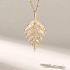 ✥ Surprise her with our Round Cut Diamond Leaf Pendant Necklace, a gift that embodies elegance and nature's beauty. This exquisite piece features a delicate leaf-shaped pendant adorned with sparkling round cut diamonds, symbolizing growth and renewal. Perfect for any occasion, from daily wear to special celebrations, this necklace adds a touch of sophistication and charm to her ensemble. Crafted with meticulous attention from high-quality materials, it ensures lasting beauty and durability. An i Yellow Gold Leaf Shape Nature-inspired Jewelry, Yellow Gold Leaf-shaped Formal Jewelry, Formal Yellow Gold Leaf-shaped Jewelry, Formal Yellow Gold Leaf Jewelry, Elegant Leaf-shaped White Gold Jewelry, Elegant White Gold Leaf-shaped Jewelry, Elegant Sterling Silver Leaf-shaped Necklace, 14k Yellow Gold Leaf-shaped Jewelry, Nature-inspired Yellow Gold Jewelry With Rose Cut Diamonds