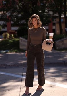 Comfy yet stylish, our Dark Olive Corduroy Cargo Pant has a high-waisted design with button and zipper closure, cargo pockets, and straight legs for an edgy look. Made of soft, stretchy corduroy, it's perfect for elevating your fall wardrobe. Ideal for a casual autumn weekend. Fabric 97% Cotton 3% Spandex Hand wash cold. Fashion Relaxed Outfit Ideas, Powerful Style Women, Streetwear Fashion Office, Business Casual Closet Capsule Wardrobe, Women’s Fashion Aesthetic, Classy Fashion Casual, Corduroy Work Outfit, Autumn Outfits Pants, Cold Weather Business Casual Women