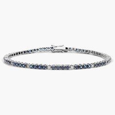 Everything you need to bring dazzling color to your look is here on this 14k white gold bracelet featuring quadruplets of sapphires interrupted by brilliant white diamonds. Classic Sapphire Diamond Bracelet For Anniversary, Classic Diamond Bracelet With Sapphire, White Gold Sapphire Tennis Bracelet For Formal Occasions, Sapphire Diamond Bracelet For Anniversary, Sapphire Bracelets With Prong Setting For Anniversary, Formal Sapphire Bracelets With Diamond Accents, Sapphire Cubic Zirconia Diamond Bracelet For Anniversary, Classic Sapphire Tennis Bracelet With Brilliant Cut, Anniversary Diamond Bracelet With Sapphire