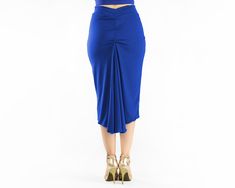 "This handmade reversible ''Vina'' high waisted tango skirt is made with a soft jersey fabric in 2 different colors. Fully reversible, 2 in 1 skirt! A must- have skirt for milongas. Featuring a back ruched fishtail which eases movement while dancing, this skirt is elegant and very comfortable for dancing! Available in different colors and sizes. Details: - High waist band. - Fully reversible. Two layers, blue and black - Front length: 68 cm/ 26.7 in (If you need a different length, please, let m Blue Stretch Gathered Skirt, Fitted Ruched Draped Midi Skirt, Fitted Midi Draped Skirt With Gathered Detail, Fitted Gathered Maxi Skirt For Night Out, Fitted Blue Midi Skirt, Blue Stretch Maxi Skirt For Party, Blue Ruched Skirt For Night Out, Party Fitted Flared Wrap Skirt, Fitted Blue Gathered Skirt Bottoms