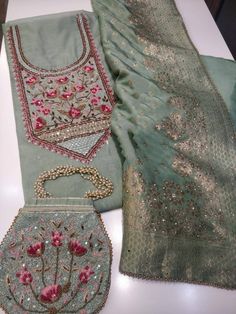 Item Overview ATHARVA Hand Embroidery Salwar Kameez/Embroidery Neck Mint Green/Banarsi Silk Dupatta w Stones /Custom Stitch/Embroidery Potli Dno. CH1697 Fabric: * Shirt - Chanderi Silk- Hand Embroidered Neck- 2.5 Mts - Beautiful Hand Embroidery * Dupatta: Banarasi Dola Silk Dupatta- All over Embroidery - 2.5 Mts- Latkans Tassels * BEAUTIFUL EMBROIDERED POTLI * Bottom Santoon Silk 2.5 Mts. Excusive Hand Embroidered Party Wear Punjabi Suit. Customization: * Fabrics Customization: Designs Can be ma Embroidered Raw Silk Sharara With Straight Kurta, Pista Green Raw Silk Kurta With Resham Embroidery, Pista Green Raw Silk Anarkali Set With Chikankari Embroidery, Pista Green Raw Silk Anarkali Set With Chikankari, Pista Green Chikankari Anarkali Set In Raw Silk, Transitional Embroidered Designer Sharara, Transitional Designer Embroidered Sharara, Transitional Season Designer Embroidered Sharara, Designer Embroidered Raw Silk Sharara