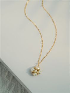 This exquisite piece features a delicate clover pendant adorned with intricate details, symbolizing good fortune and prosperity. Crafted with meticulous attention to detail, the necklace exudes elegance and sophistication. Whether worn for everyday elegance or special occasions, this necklace adds a touch of whimsical beauty to any ensemble. Metal: 14K Gold Filled Gemstone: Freshwater Pearl Chain Diameter: 450mm(includes adjustable chain) Exquisite Pearl Chain Necklace As Gift, Exquisite Pearl Chain Necklace For Gift, Elegant 14k Gold Necklaces For Good Luck, Elegant 14k Gold Necklace For Good Luck, Elegant Yellow Gold Flower Pendant Charm Necklaces, Pearl Charm Flower Pendant Necklace For Gift, Pearl Charm Flower Pendant Necklace As Gift, Elegant Flower Charm Necklace With Round Pendant, Elegant Gold Charm Necklace With Flower Charm