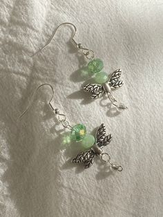 These earrings are hypoallergenic!! Cute with many outfits and are so stylish. Fly Earrings, Light Green Earrings, Many Outfits, Aesthetic Green, Dragon Fly, Wire Wrapping Crystals, Green Dragon, Green Earrings, Green Aesthetic