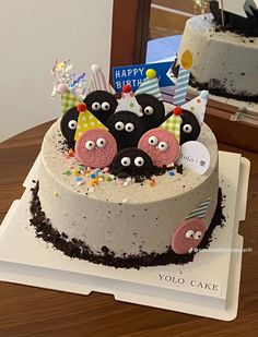 there is a birthday cake that has eyes on it