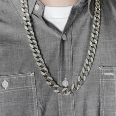 Men's silver-tone Cuban hip hop chain. Every other link is iced with round stones. Stones shine so hard they will blind you. Measures 30" long x 14mm thick. Solid piece weighs in at 150 grams. Stylish and secure box clasp closure. FREE SHIPPING in USA. Order now! Iced Chain, Silver Cuban Chain, Ice Necklace, Ice Stone, Hip Hop Chains, Celebrity Stars, Silver Bling, Bling Necklace, Box Clasp