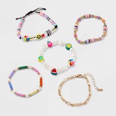 Accessorize your kid's ensemble using this Girls' 5pk Fruit and Smiley Bracelet Set by art class™. It features vibrant fruit and smiley face charms that can be worn with many outfits. The comfortable 6.5-inch length and a mix of lobster claw clasp and pull-on styles, this set ensures easy wear and a secure fit. Whether it’s a party or a fashion show, these fruit and smiley bracelets are a great addition to any young fashionista's collection. Art Class™: One-of-a-kind looks for the one and only y Beaded Bracelets With Smiley Face, Smiley Bracelet, Beaded Fruit, Fruit Bracelet, Vbs 2024, Bracelets Patterns, Kandi Bracelets, Diy Bracelets Patterns, Bracelets Diy