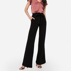 Original Retail Price: $79.90 Smooth And Sophisticated, These High Waisted Pants Are Perfect For The Office Thanks To A Paperbag Waist, Sleek Fabric And A Roomy Wide Leg. We Love Them Paired With A Portofino And Heels. Product Details - Size: Women’s Xs - Color: “Pitch Black” - Ultra Comfortable Fit - Wide Leg Style For Long Legs - Paperbag Style - High Rise - Elastic Waistband Makes Tucking In Any Top Easy! - New With Tags! - Inseam: ~32” **Check Out My Page For More Great Express Finds! ***Alw Evening High Waist Wide Leg Pants With Pockets, Elegant Wide Leg Pants For Summer Date Night, Elegant Summer Wide Leg Pants For Date Night, High-waisted Wide Leg Pants With Pockets For Evening, High-waisted Wide Leg Pants For Evening With Pockets, Evening High-waisted Wide Leg Pants With Pockets, Chic Wide Leg Pants For Date Night, Elegant Bottoms With Pockets For Evening, Chic Formal Bottoms