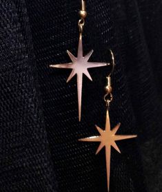 Gold plating or Silver 925 Star Earrings, designed as the star of Bethlehem, which makes them also a perfect Christmas gift. Star Long Dangle Earrings made of 14 karat gold plated brass or strling silver. These unique long dangle earrings feature beautiful matte gold plated over brass star dangling from ear wire. Chic and stylish earrings! These earrings measure approx 35/22 mm from the top of the star to the bottom of the star. Celestial Star-shaped Earrings For Pierced Ears, Star-shaped Single Earring As Gift, Star Shaped Single Earring As Gift, Star Shaped Single Earring For Gift, Rose Gold Star-shaped Pierced Jewelry, Silver Starburst Celestial Earrings, Celestial Star-shaped Pierced Earrings, Rose Gold Star Charm Earrings, White Celestial Star Earrings