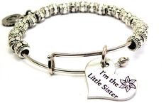 This is a beautifully crafted bangle, hand strung with metal beads and features a focal charm made of genuine American pewter. This bangle is expandable from 7-8" inches, making it one size fits most. All items are made right here in the USA. Our bracelets make a perfect gift for yourself or a loved one for any occasion. Adjustable Sterling Silver Stretch Bracelet Gift, Adjustable Metal Beaded Bracelets For Friendship, Silver Nickel-free Bangle For Friendship, Metal Beaded Charm Bracelet Gift, Adjustable Silver Bangle With Silver Beads, Adjustable Silver Bangle With Beads, Silver Bracelets With Silver Beads For Friendship, Adjustable Antique Silver Metal Bangle, Personalized Adjustable Metal Jewelry