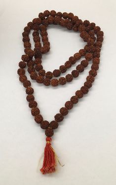 "Beautiful vintage genuine quandong seed bead necklace or prayer bead necklace good pre/owned measures 19\" across and 38\" overall length." Spiritual Rosary With Large Beads, Spiritual Beaded Necklaces With Polished Beads For Festivals, Spiritual Style Polished Beaded Necklaces For Festivals, Handmade Brown Necklace For Puja, Brown Necklaces For Puja And Festivals, Festival Brown Necklace For Puja, Polished Beads Spiritual Necklaces For Puja, Spiritual Polished Beads Necklace For Puja, Spiritual Necklaces For Puja With Polished Beads