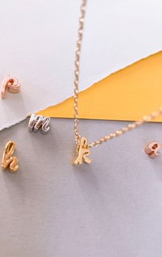 A beautiful Rose Gold plated Letter Necklace personalized with your chosen Letter / shiny and minimalist necklace. This necklace has gift box. (individually) Details: - Materials used: Rose Gold plated Brass Chain, approx 5mm*7mm shiny rose gold plated lowercase initials. - Necklace Length is available in 4 sizes; 14 Inch (Child between 4 and 12 approx) 16 Inch (Teenager size or Adult short necklace) 18 Inch (Standard Adult size) (shown) 20 Inch How to purchase: Please select from the drop down Rose Gold Name Necklace For Birthday Gift, Minimalist Rose Gold Name Necklace As Gift For Her, Dainty Rose Gold Name Necklace As Gift For Her, Rose Gold Name Necklace For Birthday, Minimalist Personalized Charm Necklace For Birthday, Minimalist Personalized Charm Necklaces For Birthday Gift, Dainty Initial Pendant Charm Necklace For Gift, Dainty Initial Pendant Charm Necklace As Gift, Dainty Initial Necklace For Birthday