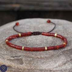 This delicate adjustable bracelet makes a wonderful gift for yourself, friend or loved one. The wax rope expands to easily slip onto any sized wrist and can be tightened to fit.             Size is approx 6,9 inches.  Red agate imparts a sense of stability and sheds light on the areas of your life where there might be some weaknesses. Its meaning is tied also to passion, self-love, and perseverance       Please note: All natural stone will have slight color difference. Each stone is unique in it Adjustable Length Beaded Bracelets As Gift, Adjustable Beaded Bracelets With Sliding Knot As Gift, Spiritual Friendship Bracelets With Round Beads, Resizable Spiritual Friendship Bracelets With Beads, Spiritual Resizable Friendship Bracelets With Round Beads, Dainty Adjustable Beaded Bracelet, Adjustable Minimalist Hand-strung Friendship Bracelets, Minimalist Adjustable Hand-strung Friendship Bracelets, Adjustable Braided Bracelets, Hand-strung, Gift