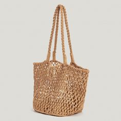 Introducing the Tan Open Weave Tote. The open weave design adds a touch of laid-back charm, making this tote the perfect companion for both beach days and casual outings. This tote offers both fashion and function, providing plenty of space to carry your essentials while complementing your summertime wardrobe. Whether you're heading to the beach, running errands, or meeting friends for a leisurely brunch, this tote is a chic and convenient option to complete your look. Product code: CAC12F4B001H Brown Crochet Bag With Braided Handles For Vacation, Brown Braided Crochet Bag For Beach Season, Brown Open Weave Beach Bag For Vacation, Casual Brown Braided Beach Bag, Brown Crochet Bag With Open Weave For Vacation, Brown Open Weave Crochet Bag For Vacation, Casual Braided Crochet Bag For Vacation, Casual Brown Crochet Bag For Vacation, Brown Braided Crochet Bag For Beach