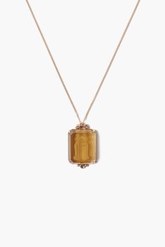 Wear your star sign with this elegant whiskey quartz pendant featuring an engraved gemini intaglio and .03ct diamond inlay on a 14k gold chain. 14k yellow gold. Chain Length: 17" - 19" adjustable, Pendant: 14x18mm Handmade in Vietnam. Gold Intaglio Necklace, Gemini Necklace, Ideal Closet, Zodiac Pendant Necklace, Zodiac Necklace, Solid Gold Chains, Zodiac Pendant, Gemini Zodiac, Zodiac Necklaces