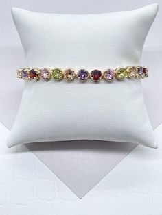 "18k Gold Filled Round Multi-Color Zirconia Bracelet. Buy with confidence we add insurance to every shipping package. Our Etsy store was developed to help you find the most unique styles of modern designs, always looking for elegance and market trends. Here you will find ways to better make your jewelry through quality, seeking harmony, exclusivity and impeccable finish. Find many more styles in our Milie Jewelry Etsy Store. https://www.etsy.com/shop/miliejewelry You can choose from unique style Bracelet Supplies, Cubic Zirconia Bracelet, Cz Bracelet, Market Trends, Hand Chain, Solid Gold Jewelry, Cuban Link Chain, Unique Styles, Miami Fl