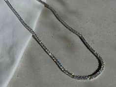 "Welcome to my store! I invite you to enjoy our massive holiday gift sale!! Up to 20% off + free worldwide shipping!! This gorgeous Dainty Rhinestone Choker Necklace is the perfect piece of jewelry to add a touch of elegant style.  It can also be perfect as a dainty bridal necklace or great holiday gift ideas for someone you love! ♦ Material ♦ - The choker necklace is made of 100% 925 sterling silver with rhodium plated. - Cubic Zirconia stones inlaid. ♦ Sizes ♦ Necklace length: 13.8\" (35 cm) + 2.4\" (6cm) Necklace width:  0.1\" (0.2 cm)  NOTES ♦ Each jewelry item is expertly handcrafted with great care and completed as swiftly as possible, typically within 1-5 business days. ♦ Each product is elegantly packaged in a designed gift box, ready to be presented to your loved one.  A blank car Silver Diamond Cut Tennis Necklace Gift, Silver Tennis Necklace With Clavicle Chain For Wedding, Silver Tennis Necklace With Rhinestones, White Gold Clavicle Chain Tennis Necklace Gift, White Gold Tennis Necklace Clavicle Chain Gift, Silver Crystal Tennis Necklace With Clavicle Chain, Crystal Tennis Necklace With Sparkling Stones For Gift, Gift Crystal Tennis Necklace With Sparkling Stones, White Gold Crystal Tennis Necklace Gift