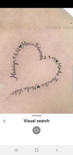 the back of a woman's shoulder with writing on it