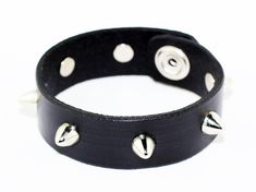 Handmade Black Leather Bracelet. Great gift! Available sizes: 6.5 inches(16.5 centimeters), 7 inches(17.7 centimeters), 7.5 inches(19 centimeters), 8 inches(20 centimeters). Very comfortable & easy to wear. Probably about 1,5 centimeters wide. Black Edgy Bracelets As Gift, Edgy Bracelet Strap Jewelry Gift, Edgy Jewelry Bracelet Strap Gift, Edgy Jewelry With Bracelet Strap For Gift, Edgy Jewelry Bracelet Strap As Gift, Handmade Punk Wristband Perfect For Gifting, Adjustable Edgy Wristband As Gift, Handmade Punk Wristband Ideal For Gift, Handmade Punk Wristband For Gift