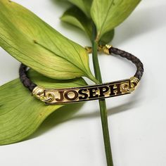 "Details: ~14k  Solid Yellow Gold - 14k Solid White Gold - 14k  Solid Rose Gold - Sterling Silver  ~Genuine Breaded Leather Bracelet ~ID Dimensions: 1.6\" ( 40 mm )  X 0.28\" ( 7.0 mm ) ~14k Gold Lobster Clasp ~14k Gold solid adjustable links Processing Time and Shipping: ~Production time is 7 to 10 business days ~Expedited production is available additional fee applies) ~Standard shipping is free, options to upgrade shipping to (2-4 Days Priority) or (1-2 Day Priority Express) are available dur Classic Engraved Adjustable Gold Bracelet, Customizable Adjustable 14k Gold Name Bracelet, Customizable 14k Gold Adjustable Name Bracelet, Customizable Yellow Gold Nameplate Bracelet, Classic Yellow Gold Bracelets With Engraving Option, Adjustable Nameplate Jewelry With Engraving Option, Classic Adjustable 14k Gold Name Bracelet, Engraved Brown Bracelet Jewelry, Personalized Brown Bracelet Jewelry