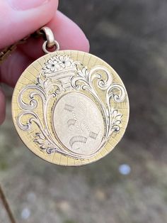 This is a true rare antique find. The outside has been tested as 14K gold. The hinge is in great working condition and the snap closes very secure. The hand engraving is top notch. Measures 31.5mm wide, 4mm deep. The locket weighs 14.8g. R Initial, Crest Monogram, Picture Locket, Pocket Watch Chain, Watch Chain, Rare Antique, Hand Engraving, Gold Stars, Pink Tourmaline