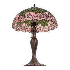 a table lamp with pink flowers on the shade and chain hanging from it's base