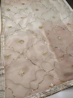 Item Overview ATHARVA Hand Embroidered/Indian Wedding Dupatta in Beige Pink/Gota Patti Jaal/Fabric Options Available w/Tassels/Duppata/Stolls/Wrap ⚘Dno. DUP4 ⚘Fabric: Soft Chiffon Chinnon Dupatta- 2.5Mts broidered Gota Patti Dupatta/ Stole/ Scarf in Black ⚘Fabric: Options Available A. Net B. Organza C. Chiffon Chinnon D. Georgette E. Tabby Silk F. Pure Chiffon (Chamandi) ⚘Length: 2.5 Mtrs ⚘Width: 1.12 Mtrs ⚘Excusive Hand Embroidered Gota Patti Work ⚘Excusive Hand Embroidered Party Wear. ⚘Customi Luxury Art Silk Embroidered Fabric With Gota Work, Festive Dupatta With Gota Work, Luxury Georgette Dupatta With Gota Work, Luxury Cream Dupatta With Dori Work, Luxury Salwar Kameez With Gota Work For Wedding, Cheap Bollywood Dupatta With Motifs, Luxury Pink Dupatta With Motifs, Luxury Chiffon Dupatta With Zari Work, Luxury Women's Dupatta With Dori Work