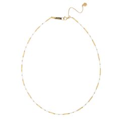 Indulge in the exquisite craftsmanship of our Handmade 18K Tube Beading Ceramic Chain. This one-of-a-kind necklace is made with 18K gold and features a unique ceramic chain. With a length of 16-18" and our signature silicon slide extender, this piece will elevate any outfit. Luxury White Chain Necklace With Adjustable Chain, White Pearl Chain Necklace With Round Beads, White Luxury Necklace With Delicate Chain, Luxury White Necklace With Delicate Chain, White Delicate Chain Necklace In Gold Plated, Luxury Long Beaded Chain Necklace, Luxury Beaded Long Necklace, Luxury White Chain Necklace As Gift, Luxury White Chain Necklace For Gift