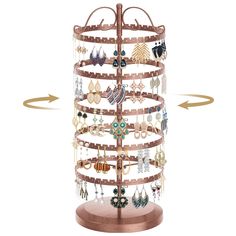 a jewelry rack with earrings on it and an arrow pointing up to the right side