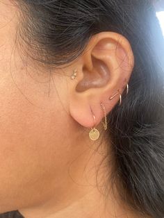 Sometimes simple is best. These ultra lightweight petite dangles are ideal when you just want a tiny bit of movement and shimmer on your ears. These earrings also utilize a lighter weight ear wire, so are also ideal for people newer to wearing dangle earrings. Hypoallergenic Small Hoop Earrings In 14k Gold Filled, Nickel-free Dainty Huggie Earrings, Delicate Hypoallergenic Small Hoop Earrings, 14k Gold Dangle Cartilage Earrings For Everyday, 14k Gold Dangle Cartilage Earrings, Simple Tiny Everyday Piercings, Dainty Tiny Cartilage Earrings For Everyday Wear, Simple Round Cartilage Earrings, Dainty Nickel-free Small Hoop Earrings